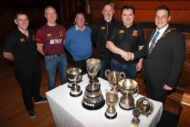 The Mayor of Derry City and Strabane District Council, Graham Warke welcoming Norman Allen, chairman Bready Cricket Club to a reception at the Guildhall. Included from left are committee members David Scanlon, Mark Olphert, Ivan Rutherford and Trevor Hamilton. Picture by Jim McCafferty