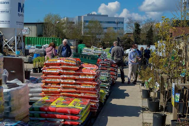 Customer shopping in the Springrowth Landscape and Garden Centre, Springtown Industrial Estate. DER2115GS – 025