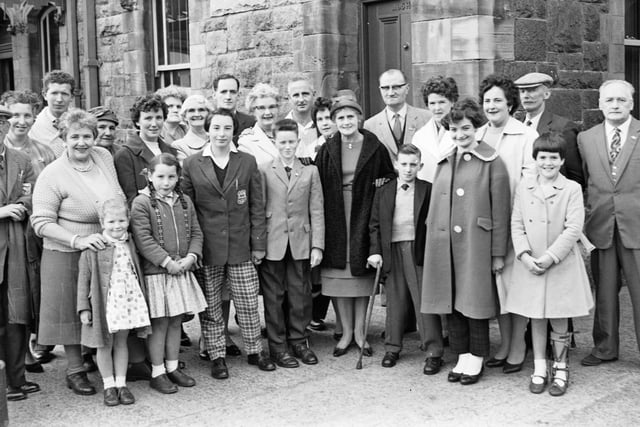 Sept 1961. Group taken prior to their departure for Brighton of four young Derry swimmers who will represent the city at the Infantile Paralysis Fellowship's annual swimming championships. The Mayoress, Mrs. GS Glover, was at Waterside Station to see them off and is seen centre with, on her left, Pat Creggan and Carol O'Bryan and, on her right, Gerald Boyle and Pauline Kearney.