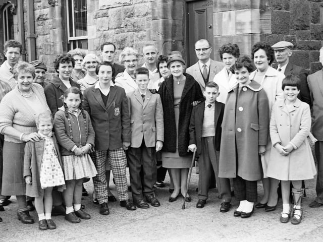 Sept 1961. Group taken prior to their departure for Brighton of four young Derry swimmers who will represent the city at the Infantile Paralysis Fellowship's annual swimming championships. The Mayoress, Mrs. GS Glover, was at Waterside Station to see them off and is seen centre with, on her left, Pat Creggan and Carol O'Bryan and, on her right, Gerald Boyle and Pauline Kearney.