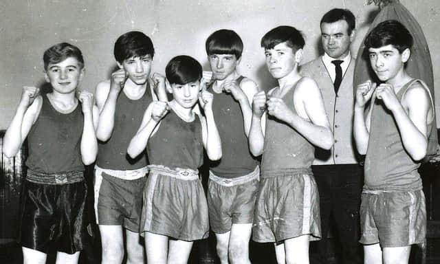 Nov 1966. St Mary's Club boxers who figured prominently in the NW area finals of the Association of Boys' Clubs' championships in Derry. From left, Pat Quigley, Charlie Nash, Thomas Devine, Jimmy Gilmour, Willie Nash, and Martin Harkin. Club coach Tommy Donnelly is with them.