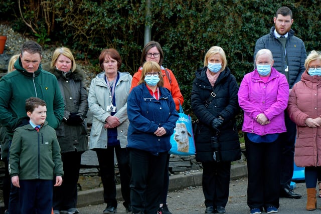 Local people outside Holy Family Church after Requiem Mass for Fr Paddy OKane on Thursday afternoon. Photograph: George Sweeney / Derry Journal. DER2213GS  041