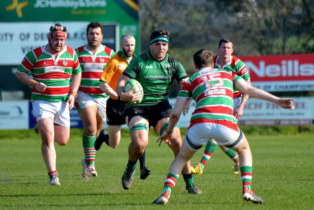 City of Derry forward Gerard Doherty on the charge against Sunday's Well last week. Derry travel to league leaders Enniscorthy tomorrow requiring something from the game to stay in with a shout of avoiding the relegation play-off. (Photo: George Sweeney)