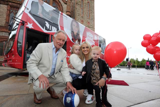 Derry legend: Pictured at the Foyle Legends bus unveiling in Guildhall Square back in 2017 were Phil Coulter, James McClean's wife Erin McClean and James McClean's children, Allie-Mae and Junior McClean.