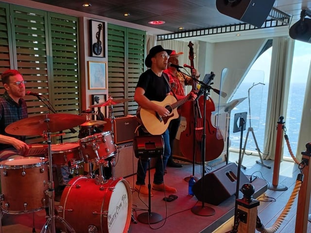 The Country Crew Trio playing Carl Perkins, Johnny Cash and Willie Nelson numbers in The Mason Jar.