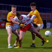 Charlie Diamond battles for the ball with Antrim's Sean Duffin and Cahir Donnelly. The Bellaghy man scored 6 frees in Derry's 0-12 to 0-9 win in Owenbeg on Friday evening. (Photo: George Sweeney)