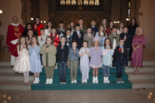 Children from St. Anneâ€TMs Primary School who received the Sacrament of Confirmation from Fr. Paul Farren at St. Eugeneâ€TMs Cathedral on Thursday. Included in photo are Mrs. Eilis McGuinness, Principal and Mrs. Jennifer Morrison, class teacher. (Photo: Jim McCafferty Photography)