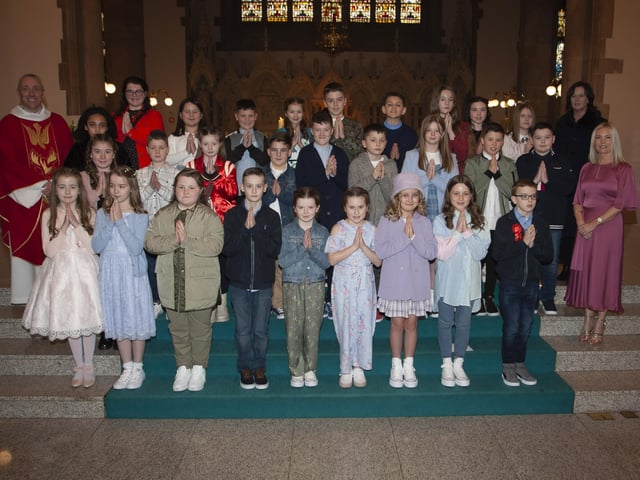Children from St. Anneâ€TMs Primary School who received the Sacrament of Confirmation from Fr. Paul Farren at St. Eugeneâ€TMs Cathedral on Thursday. Included in photo are Mrs. Eilis McGuinness, Principal and Mrs. Jennifer Morrison, class teacher. (Photo: Jim McCafferty Photography)