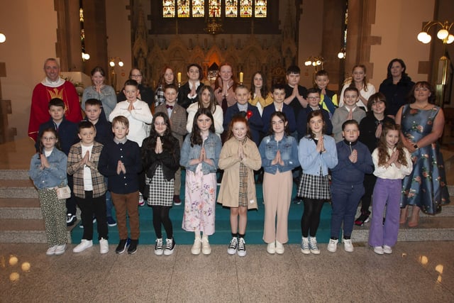 Children from St. Anneâ€TMs Primary School who received the Sacrament of Confirmation from Fr. Paul Farren at St. Eugeneâ€TMs Cathedral on Thursday. Included in photo are Mrs. Eilis McGuinness, Principal and Mrs. Emma Meehan, class teacher. (Photo: Jim McCafferty Photography)