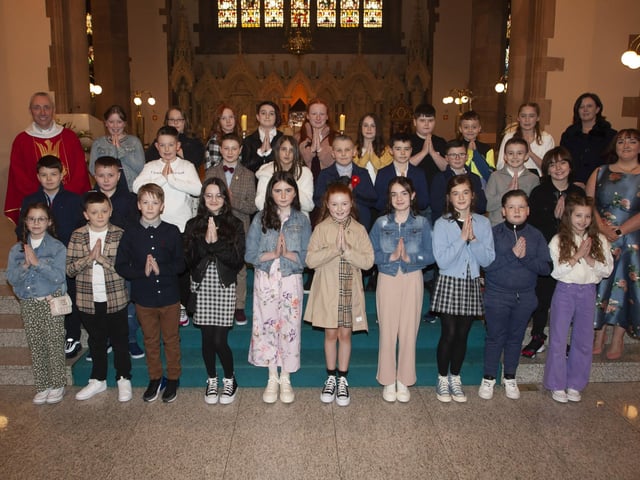 Children from St. Anneâ€TMs Primary School who received the Sacrament of Confirmation from Fr. Paul Farren at St. Eugeneâ€TMs Cathedral on Thursday. Included in photo are Mrs. Eilis McGuinness, Principal and Mrs. Emma Meehan, class teacher. (Photo: Jim McCafferty Photography)