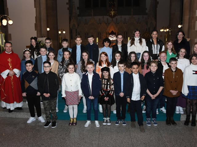 Children from St. Anneâ€TMs Primary School who received the Sacrament of Confirmation from Fr. Paul Farren at St. Eugeneâ€TMs Cathedral on Thursday. Included in photo are Mrs. Eilis McGuinness, Principal and Mrs. Suzanne McRory, class teacher. (Photo: Jim McCafferty Photography)