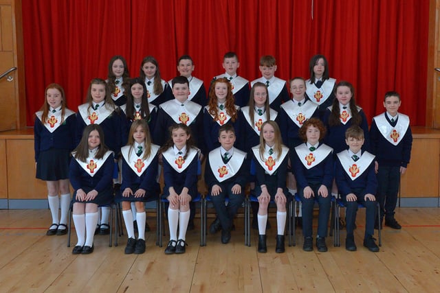Pupils from Ms Adlard’s P7 class who were confirmed on Wednesday 16th March at St Patrick’s Church Pennyburn by Fr. McDermott. Photo: George Sweeney.  DER2212GS – 011