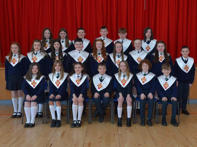 Pupils from Ms Adlard’s P7 class who were confirmed on Wednesday 16th March at St Patrick’s Church Pennyburn by Fr. McDermott. Photo: George Sweeney. DER2212GS – 011