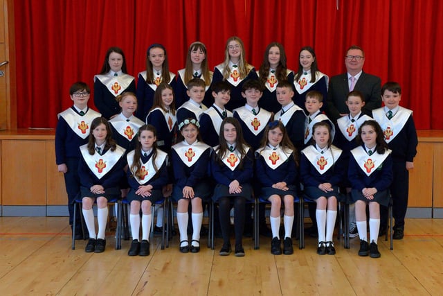 Mr Bradley pictured with his P7 class from St Patrick’s Primary School who were confirmed by Fr McDermott in St Patrick’s Church, Pennyburn, on Tuesday 15th March last. Photo: George Sweeney.  DER2211GS – 024