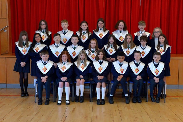 Mrs Moore pictured with her P7 class from St Patrick’s Primary School who were confirmed by Fr McDermott in St Patrick’s Church, Pennyburn, on Tuesday 15th March last. Photo: George Sweeney.  DER2211GS – 025