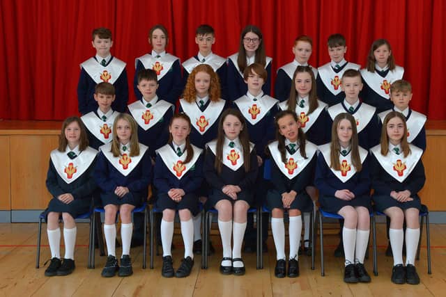 Pupils from Ms Smith’s P7 class who were confirmed on Wednesday 16th March at St Patrick’s Church Pennyburn by Fr. McDermott. Photo: George Sweeney. DER2212GS – 010