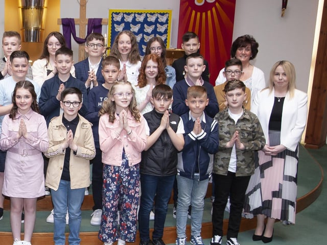 Pupils from Sacred Heart Primary School who received the Sacrament of Confirmation at the Church of the Immaculate Conception, Trench Road on Friday last. Included is Fr. Sean Oâ€TMDonnell, Mrs. Louise Cunning, Principal and Mrs. Jacqueline McDermott, teacher. (Photo: Jim McCafferty Photography)