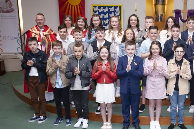 Pupils from Sacred Heart Primary School who received the Sacrament of Confirmation at the Church of the Immaculate Conception, Trench Road on Friday last. Included is Fr. Sean Oâ€TMDonnell, Mrs. Louise Cunning, Principal and Mrs. Jacqueline McDermott, teacher. (Photo: Jim McCafferty Photography)