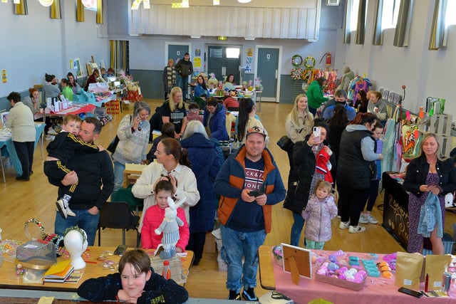 People visit the stall at the Muff Spring and Easter Fair at St Mary’s Hall on Saturday afternoon last. DER2213GS – 085