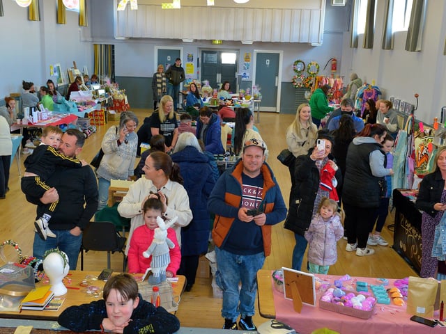 People visit the stall at the Muff Spring and Easter Fair at St Mary’s Hall on Saturday afternoon last. DER2213GS – 085