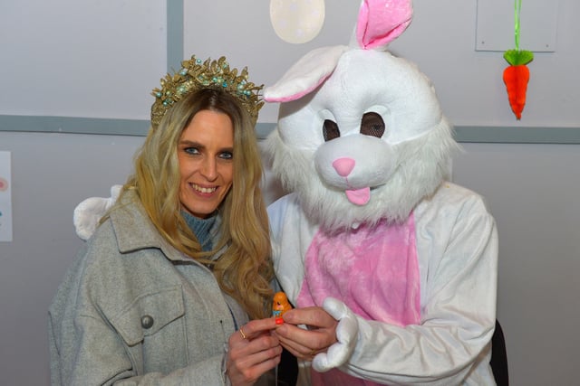 Derrywoman Mary Cassidy pictured with the Easter Bunny at the Muff Spring and Easter Fair at St Mary’s Hall on Saturday afternoon last. DER2213GS – 086