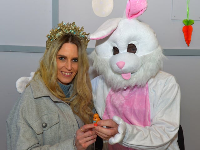Derrywoman Mary Cassidy pictured with the Easter Bunny at the Muff Spring and Easter Fair at St Mary’s Hall on Saturday afternoon last. DER2213GS – 086