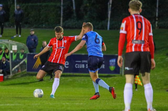 Will Patching fires into the corner of the UCD net from a free-kick in the second half. Photograph by Kevin Moore.