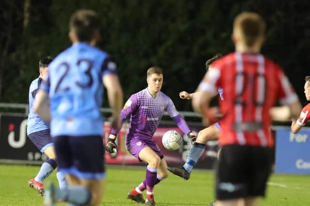 Derry City keeper Brian Maher comes off his line to clear the ball against UCD at the Bowl. Photograph by Kevin Moore.