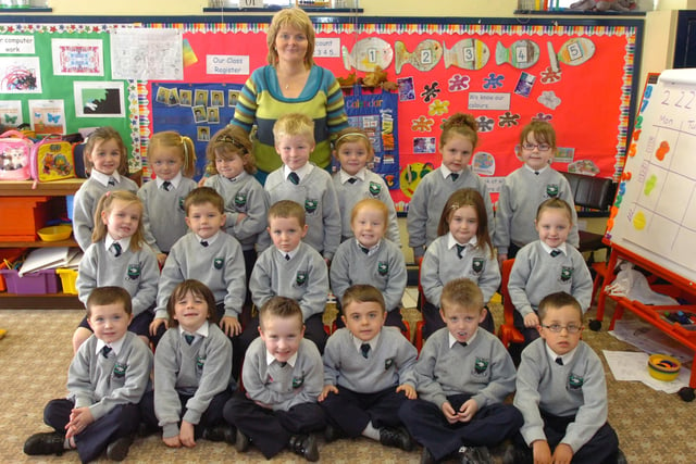 P1 pupils from Trench Road Primary School with class teacher Sarah Cairns. (2410PG04)