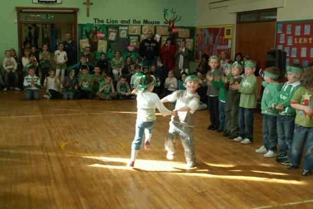 Trench Rod Primary School pupils enjoying the school's annual St.Patrick's Day ceili.  Bean an Ti for the day was Mary McGuigan and m usic was provided by  
Liam Mullan and Jimmy O Hara.