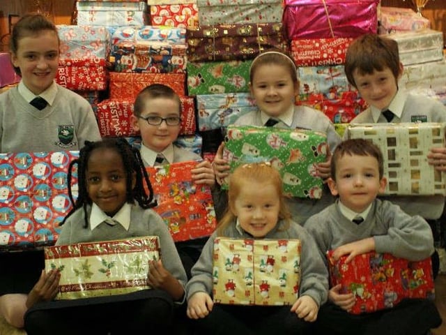 Children from Trench Road PS pictured with a selection of the 200 shoe boxes they've have collected as part of the Road of Hope campaign.  Included from left are: Laura McNamee, Manal Elshafie, Jordan Kent, Aoife McLaughlin, Aine Gillespie, Shane Doherty and Jack McLaughlin. (2511M1)