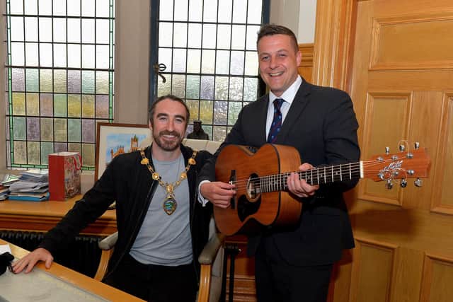 Coronas frontman Danny O’Reilly pictured with Mayor Graham Warke at the ‘Live at the Square Festival 2022’official launch of the Guildhall on Tuesday afternoon last. The Coronas with special guests Ryan McMullan, Ordhan Murphy and Rue will perform in St Columb’s Park on Saturday 28th May next Photo: George Sweeney.  DER2214GS – 005
