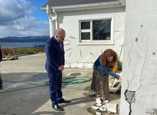 Claire McDaid shows her home to An Taoiseach Micheal Martin.