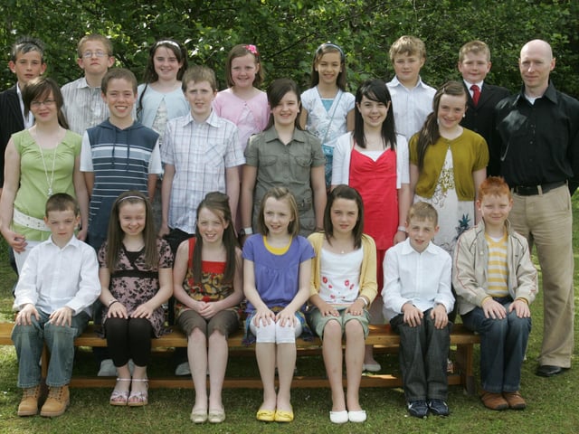 Pupils from Trench Road Primary School who were confirmed in the Church of the Immaculate Conception by Most Rev. Dr. Francis Lagan, Auxiliary Bishop of Derry. Included is Mr. Conrad McGuigan, teacher. (0106C56)