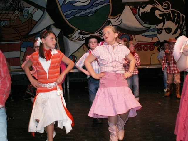 Year 5 children performing Doris Day classics from the musicals at the school's summer show in the Waterside Theatre.