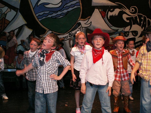 Year 5 children performing Doris Day classics from the musicals at the Trench Road Primary School summer show.