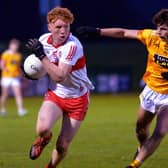Antrim’s Conall McGirr moves to challenge Derry’s Niall O’Donnell during the quarter-final at Owenbeg last Friday. Photo: George Sweeney. DER2213GS – 061