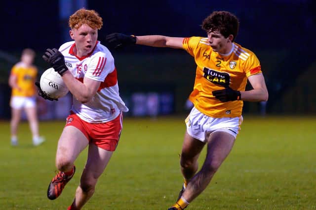 Antrim’s Conall McGirr moves to challenge Derry’s Niall O’Donnell during the quarter-final at Owenbeg last Friday. Photo: George Sweeney. DER2213GS – 061