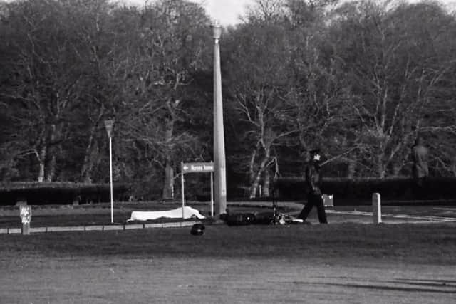 The bodies of William Fleming and Danny Doherty are left covered with white sheets after they were shot dead by the SAS in the grounds of Gransha Hospital on December 6, 1984.