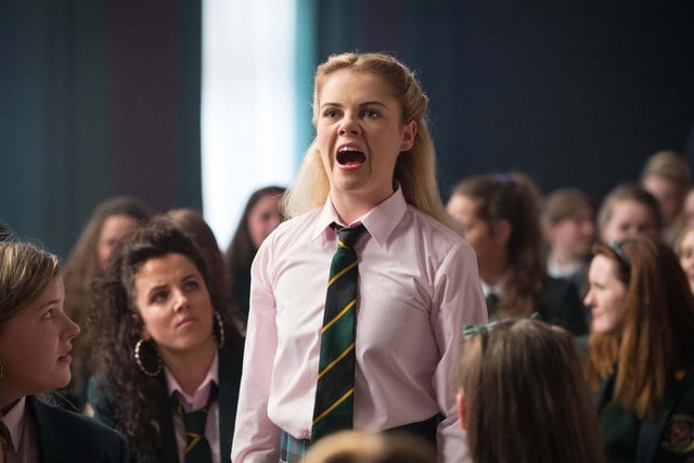 Where do you start with Erin Quinn (brilliantly played by Saoirse Monica Jackson)? The leader of the oddball pack of Derry Girls, Erin has illusions of literary grandeur with ambitions far exceeding her talent, at least at this young age. Good natured and soft hearted generally, Erin also has ruthless ambition that is often thwarted and ends in life lessons but which managed to terrify the normally unshakable Sister Michael. Erin's innocence, search for romance, impulsive nature and dramatic personality bring much of the hilarity and drive a lot of the chaos on the show. Ultimately, Erin is a youngster who is an endearing and loyal friend, someone who gets an A for effort and shines through despite circumstances. Perhaps destined for greater things after all... (Photo: Channel 4)