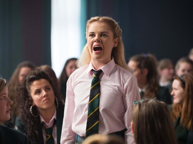 Where do you start with Erin Quinn (brilliantly played by Saoirse Monica Jackson)? The leader of the oddball pack of Derry Girls, Erin has illusions of literary grandeur with ambitions far exceeding her talent, at least at this young age. Good natured and soft hearted generally, Erin also has ruthless ambition that is often thwarted and ends in life lessons but which managed to terrify the normally unshakable Sister Michael. Erin's innocence, search for romance, impulsive nature and dramatic personality bring much of the hilarity and drive a lot of the chaos on the show. Ultimately, Erin is a youngster who is an endearing and loyal friend, someone who gets an A for effort and shines through despite circumstances. Perhaps destined for greater things after all... (Photo: Channel 4)