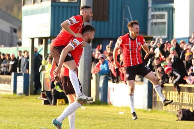 The Brandywell Beckham . . . Will Patching celebrates with Cameron McJannet and Danny Lafferty after his 88th minute free-kick finds the top corner. Photo by Kevin Moore.