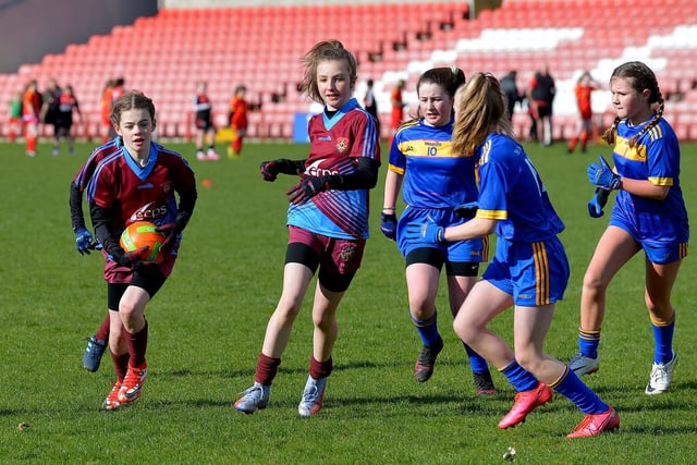 Action from St John’s v St Therese in the Celtic Park Girls’ Primary School Blitz. Photo: George Sweeney.  DER2213GS – 028