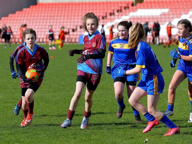Action from St John’s v St Therese in the Celtic Park Girls’ Primary School Blitz. Photo: George Sweeney. DER2213GS – 028