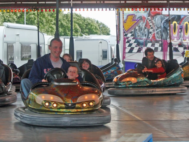 FAMILY DAY OUT!. . .Enjoying the Dodgems at Cullen's Amusements at the shorefront, Buncrana on Sunday afternoon. 2707JM16