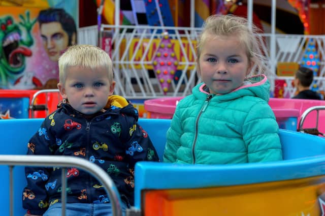 Alfie Cross, aged 2, and his sister Lily (4) were at Cullen’s Amusements, in Ebrington, last weekend. The amusements run daily until Sunday 21st September. DER2037GS – 016