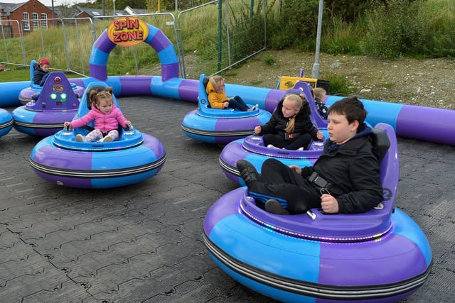 Children enjoy the bumper cars at Cullen’s Amusements, in Ebrington, last weekend. DER2027GS - 012