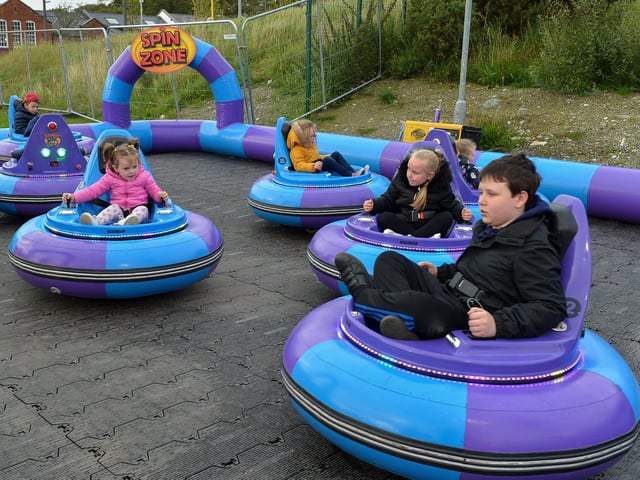 Children enjoy the bumper cars at Cullen’s Amusements, in Ebrington, last weekend. DER2027GS - 012