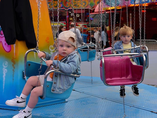 Two-year-old Ollie Doherty and Finn Owens, aged 3, pictured at Cullen’s Amusements, in Ebrington earlier this week.  The amusements run daily until Sunday  next, 21st September. DER2038GS – 034