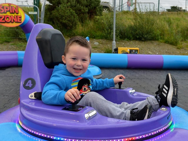 Jacob Campbell, aged 4, having a great time in the Spin Zone at Cullen’s Amusements, in Ebrington earlier this week.  Photo: George Sweeney DER2038GS – 033